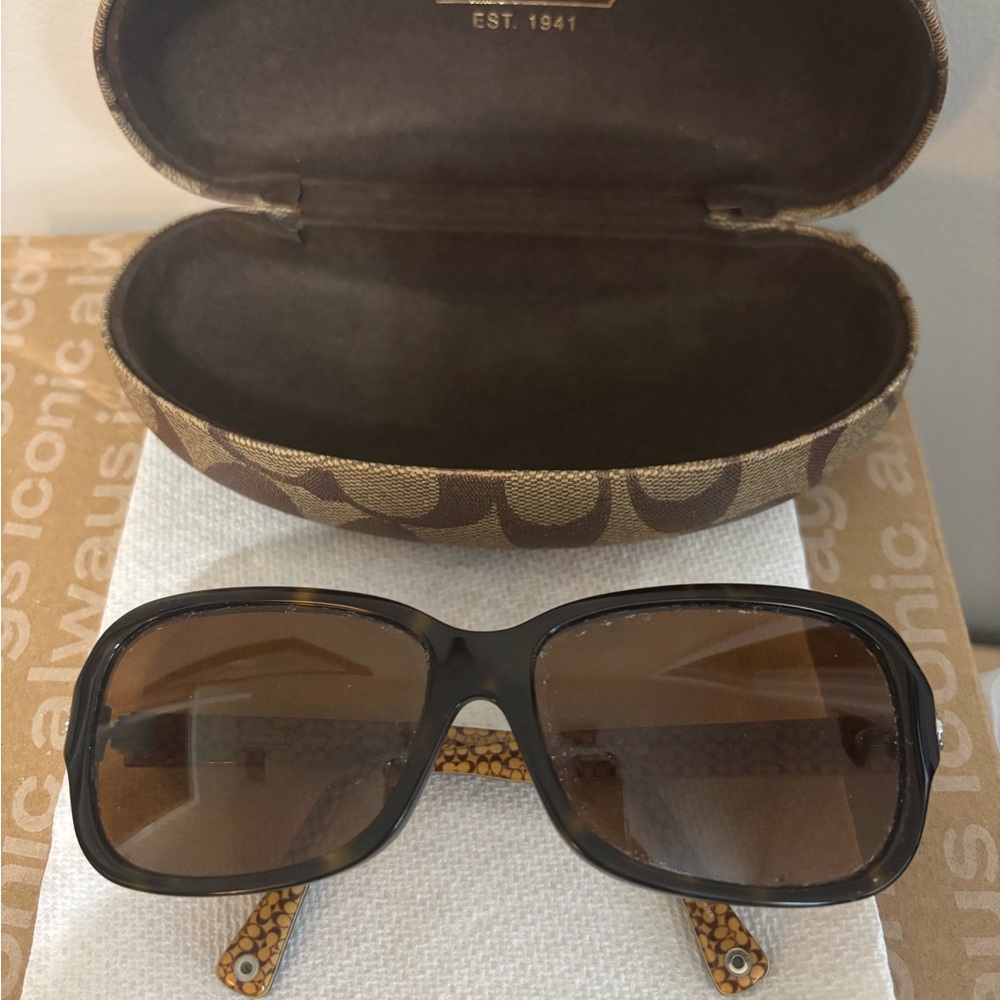 Coach Black Sunglasses with Stylish Gold Detailing